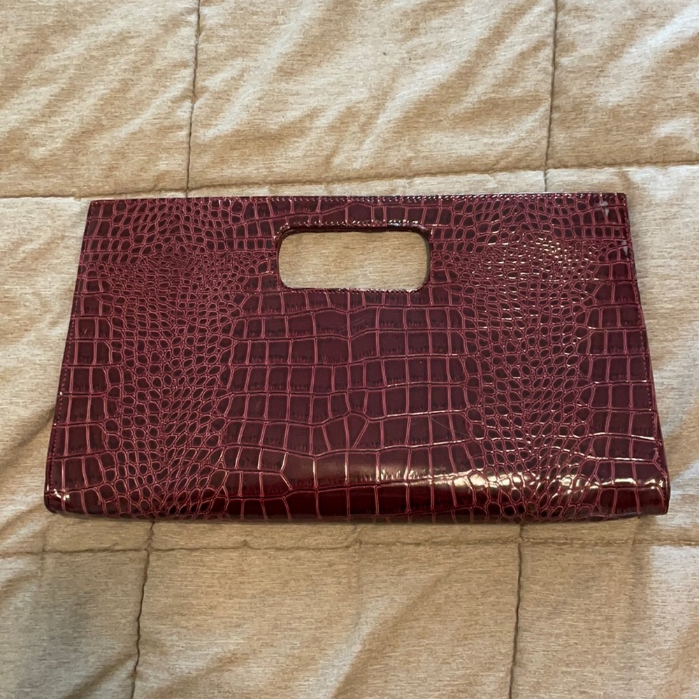 Burgundy faux snake skin clutch